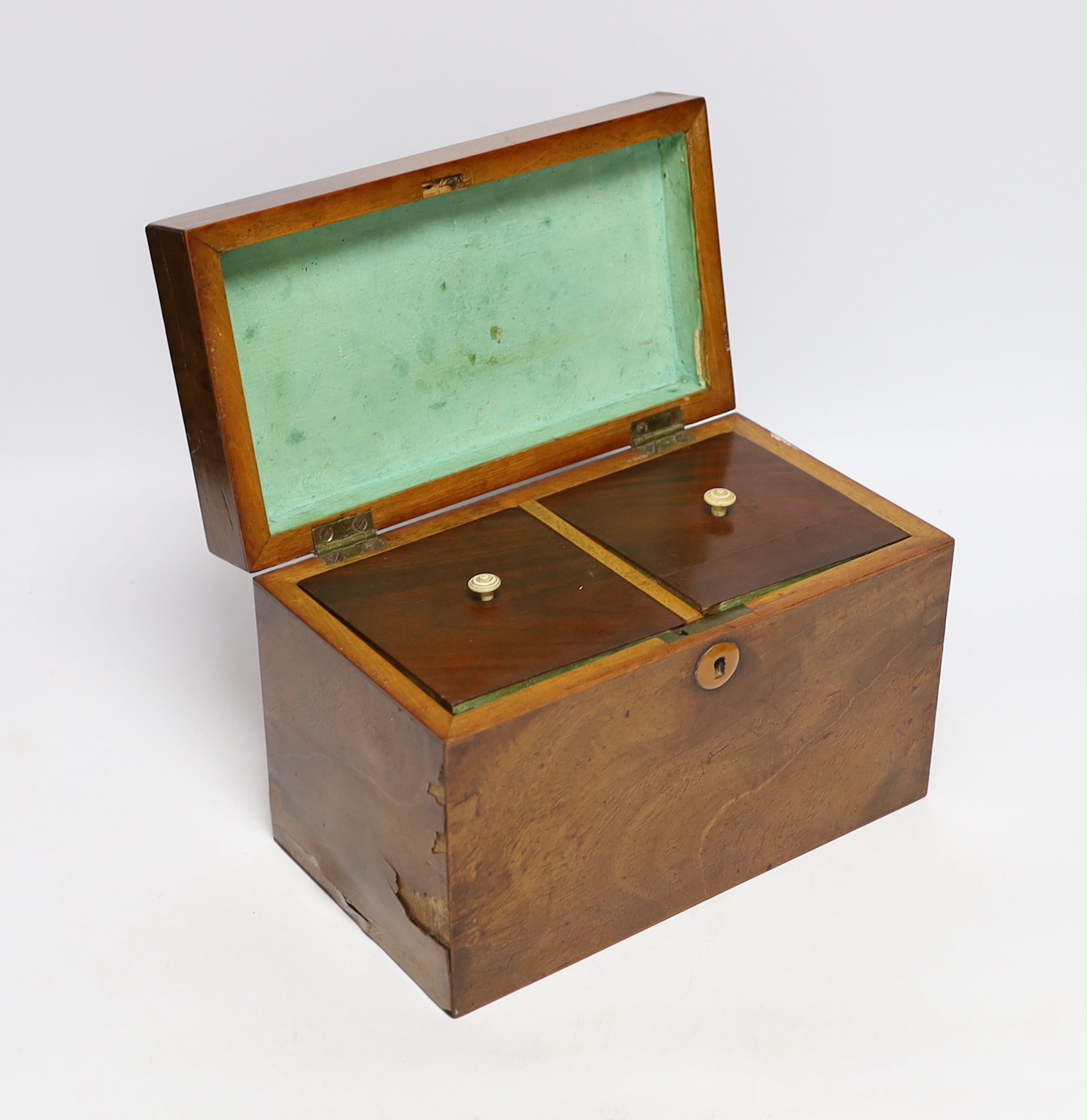 A small 19th century mahogany and fruitwood tea caddy, bone handles to interior, 23cm wide